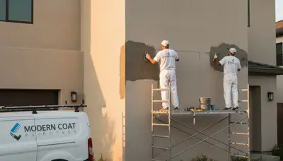 Professional stucco repair on Harrisburg PA home exterior by local house painting experts